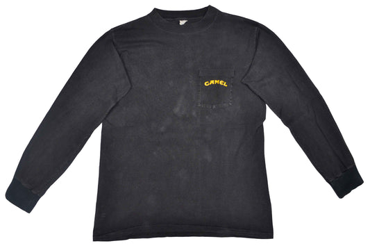 Vintage Promotional T-Shirt 1991 Camel Cigarettes "Born To Be Smooth" This is a vintage promotional shirt from the American brand of cigarettes Camel. The long sleeve presents a really good fade and vintage look.