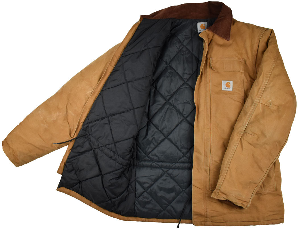 Vintage Carhartt 90s Canvas Trucker Jacket Vintage Carhartt jacket with some stains and little holes allover the piece. The jacket has a good vintage look.