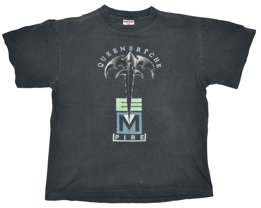 Vintage Queensrÿche 1991 "Building Empires" Tour Shirt The "Building Empire Tour" supported the fourth full-length studio album by Queensrÿche, Empire. The album stands as Queensrÿche's most commercially successful release, reaching triple-platinum status. The album won a 1991 Northwest Area Music Award for Best Metal Recording. Some stains at the back. The tee has a really good fade and vintage look.