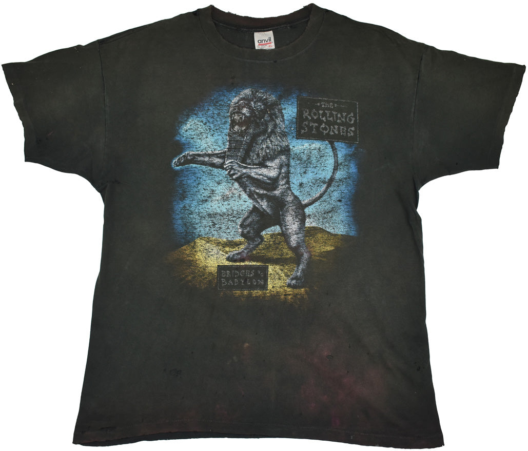Vintage The Rolling Stones 1997 "Bridges To Babylon" Shirt Bridges To Babylon was the 21st studio album by The Rolling Stones. It reached no. 3 on the US Billboard 200 in 1997 and went platinum the same year. The shirt has a crazy distressed and vintage look. Some holes and stains allover the piece. See photos for a detailed look.