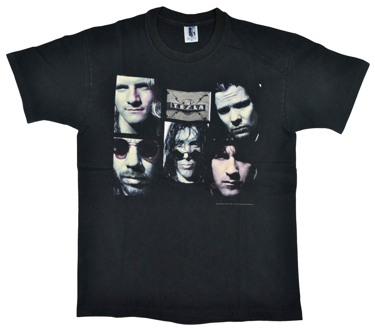 Vintage Tesla 1995 "Bust A Nut" Band Shirt "Bust A Nut" is the fourth studio album from the american hard-rock band Tesla, released in 1994. In November 2011, the album was ranked no. 10 on Guitar World magazine's top ten list of guitar albums of 1994. The tee has a good vintage look.