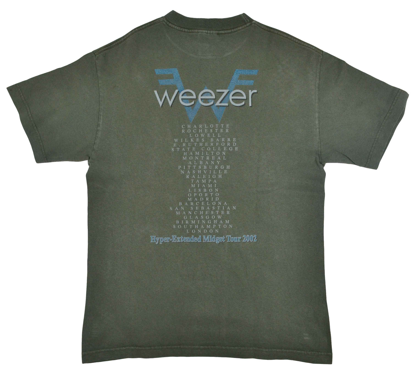 Vintage Band T-Shirt 2002 Weezer "Hyper-Extended Midget" Tour The Hyper-Extended Midget Tour supported the third studio album from the band, Green Album. With a more pop sound, the album was a commercial success and received mostly positive reviews by the fans. It debuted at number four in the United States and the song Hash Pipe was a worldwide hit, charting on seven different charts. The tee has a really good vintage look.