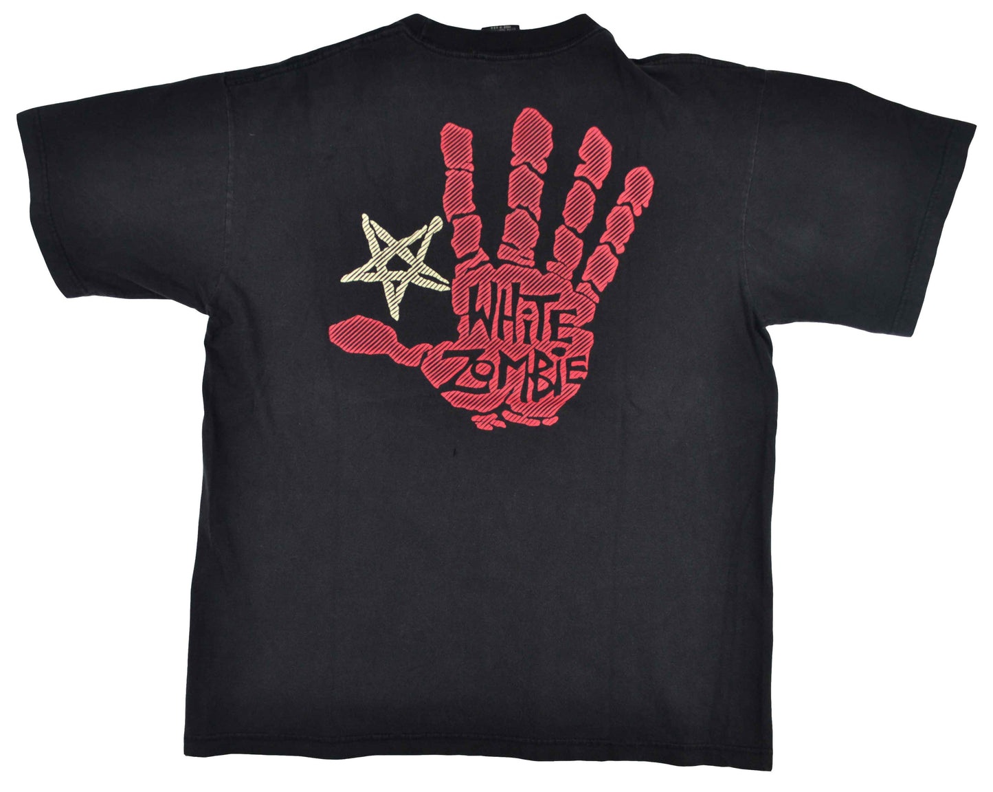 Vintage White Zombie 1996 "Art Face" Band Shirt "I don't really care about people that much, but animals, I feel like they always need to be protected". Formed in 1985, White Zombie was included in the 2000 on VH1's 100 Greatest Artists of Hard Rock, ranking at No. 56. The fade on this tee is really good. Minor damages.