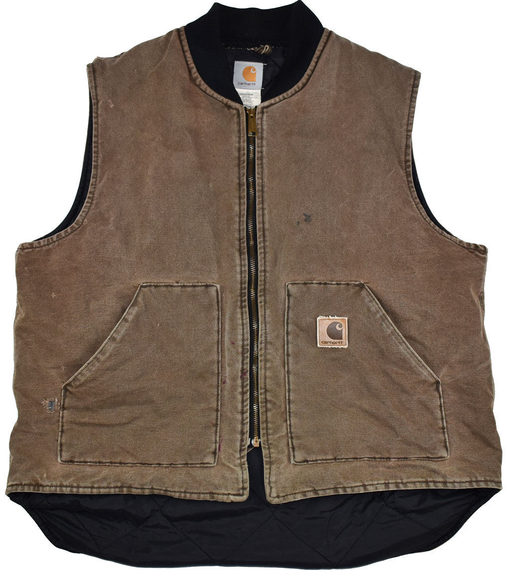 Vintage Carhartt 90s Work Vest  Vintage Carhartt vest with a really cool vintage look. The vest has some holes and stains allover the piece.
