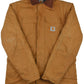 Vintage Carhartt 90s Canvas Trucker Jacket  Vintage Carhartt jacket with some stains and little holes allover the piece. The jacket has a good vintage look.