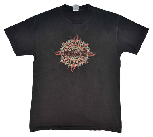 Vintage Band T-Shirt 2006 Godsmack "IV"  Godsmack is and American rock band from Lawrence. In 2006, the band released its fourth studio album simply titled IV. The album debuted at no. 1 on the Billboard 200, selling 211,000 copies in its first week. The tee has a perfect fade and a perfect vintage look.