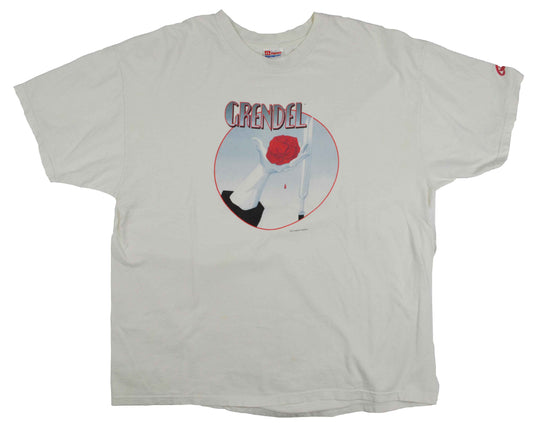 Vintage Comic T-Shirt 1999 Grendel Grendel is a long-running series of comic books originally created by American author Matt Wagner. Grendel was the masked identity of Hunter Rose, a successful author. As Grendel, he worked as an assassin before taking control of New York City's organized crime. The tee has a good vintage condition.