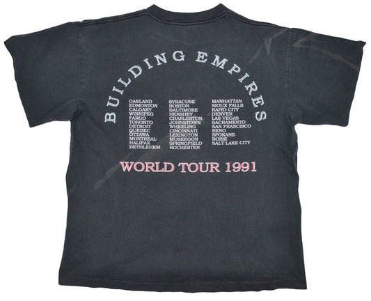 Vintage Queensrÿche 1991 "Building Empires" Tour Shirt  The "Building Empire Tour" supported the fourth full-length studio album by Queensrÿche, Empire. The album stands as Queensrÿche's most commercially successful release, reaching triple-platinum status. The album won a 1991 Northwest Area Music Award for Best Metal Recording. Some stains at the back. The tee has a really good fade and vintage look.