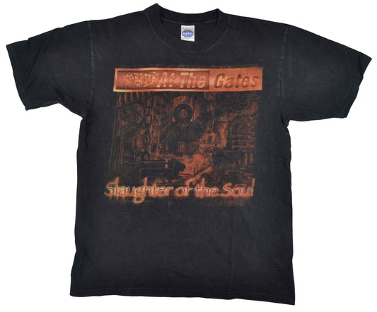 Vintage At The Gates 1995 "Slaughter The Soul" Band Shirt  Slaughter of the Soul is the fourth studio album by Swedish band At the Gates. Is considered a landmark in melodic death metal. The band's melodic and melancholic death metal style "would inspire the whole Gothenburg region". The tee has a really good fade and vintage look.