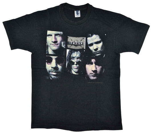 Vintage Tesla 1995 "Bust A Nut" Band Shirt  "Bust A Nut" is the fourth studio album from the american hard-rock band Tesla, released in 1994. In November 2011, the album was ranked no. 10 on Guitar World magazine's top ten list of guitar albums of 1994. The tee has a good vintage look.