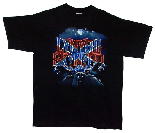 Vintage Lynyrd Skynyrd 1997 "Twenty" Band Shirt  "Take your time, don't live too fast troubles will come and they will pass". The name of the album "Twenty" refers to the fact that it had been twenty years since the plane crash which killed original lead singer Ronnie Van Zant, guitarist Steve Gaines, and backup singer Cassie Gaines